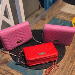 Bebe Quilted Pink and Red Clutches with Chain Straps